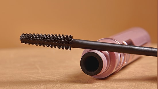 Tube of black mascara